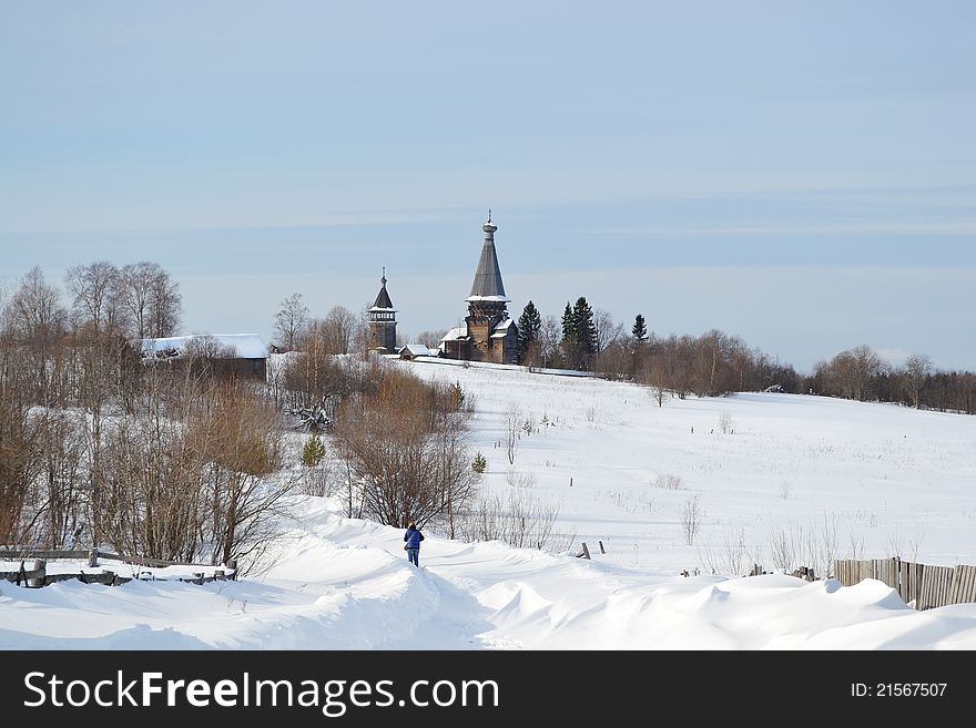 The photo of winter landscape with orthodox church