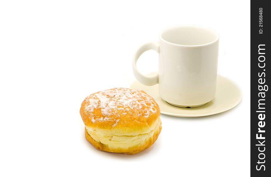 A cup of tea and a chocolate donut isolated on white