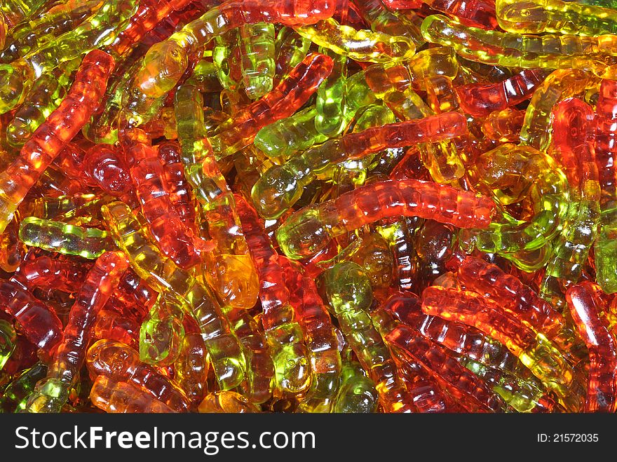 Fruit-jelly worms presented as background