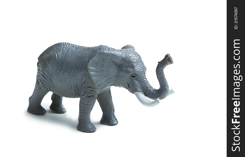 Gray toy elephant isolated on white background