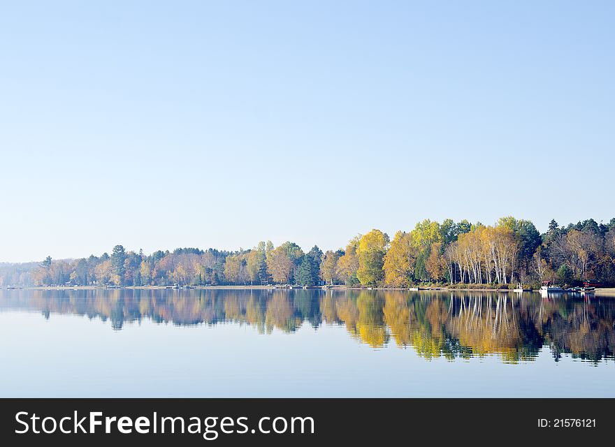 Reflection Of Fall Colors In A Lake
