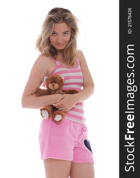 Smiling woman holding a cute teddy bear