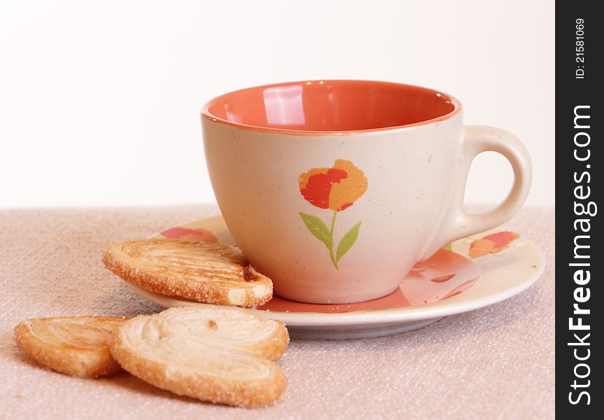 Cup of drink and three cookies for breakfast. Cup of drink and three cookies for breakfast