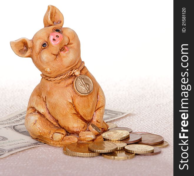 Piggy bank with coins and dollar