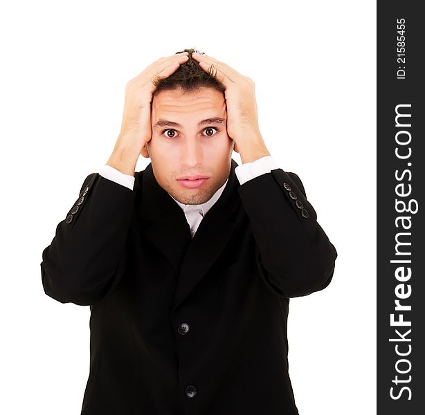 Young businessman holding head in his hands. Young businessman holding head in his hands