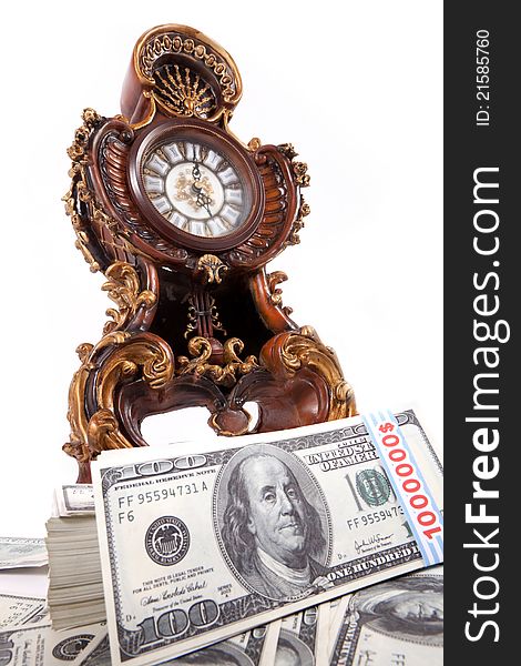 Time is Money with old clock and 100 dollars bills, Earn money, Making money. Time is Money with old clock and 100 dollars bills, Earn money, Making money