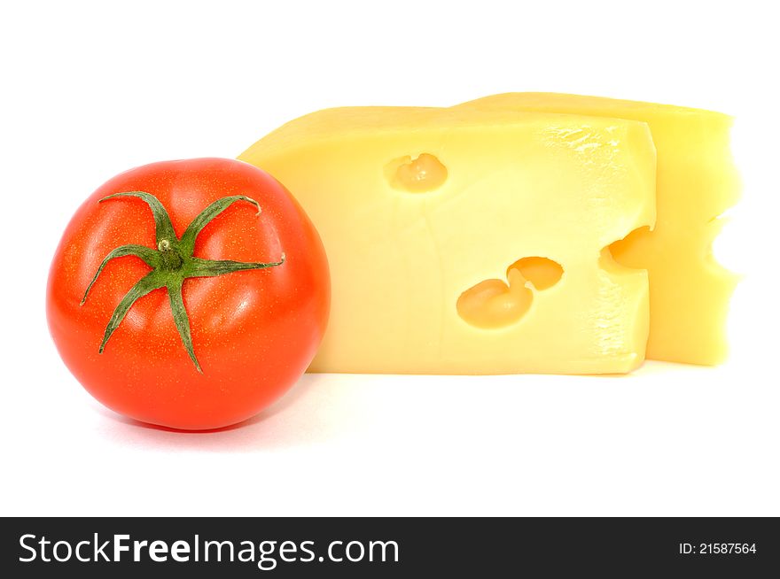 Fresh yellow cheese and tomato ,  on a white background