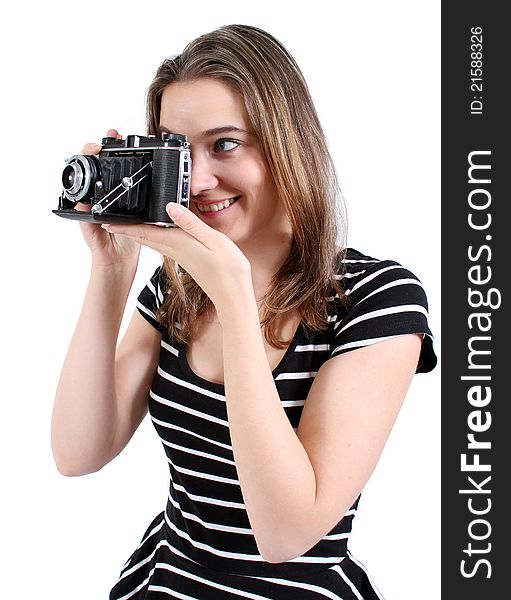 Woman taking a photograph with a vintage camera. Woman taking a photograph with a vintage camera