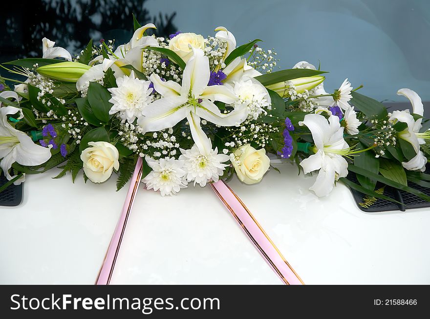 Wedding car decorated with a beautifull flowers. Wedding car decorated with a beautifull flowers