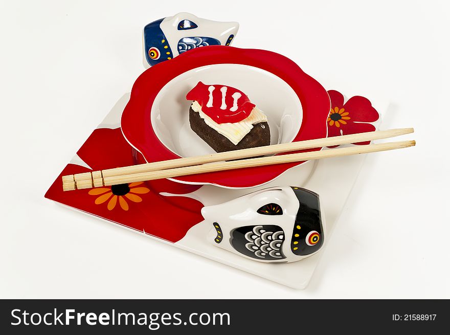 Donuts sushi set in Japanese style plate with chopsticks