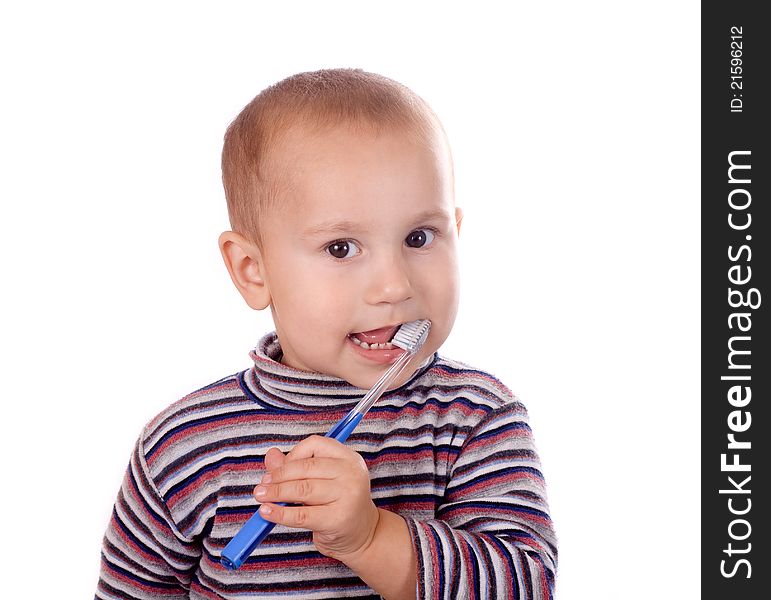 Boy brushing his teeth isolated on white background. Boy brushing his teeth isolated on white background.