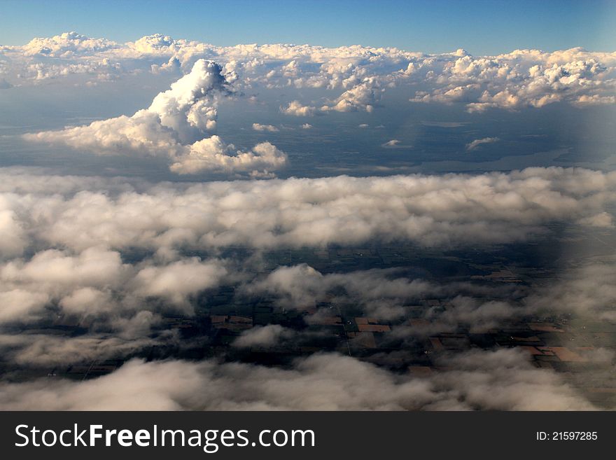 Bird's eye view through clouds. Bird's eye view through clouds