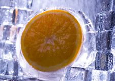 Orange With Ice Cubes Royalty Free Stock Photo