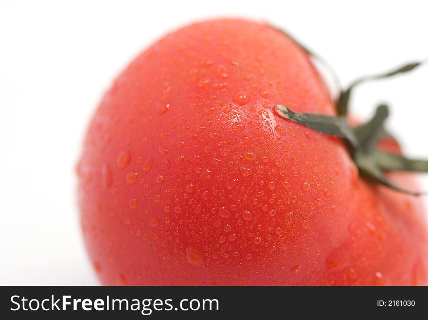 Juicy tomato isolated on white