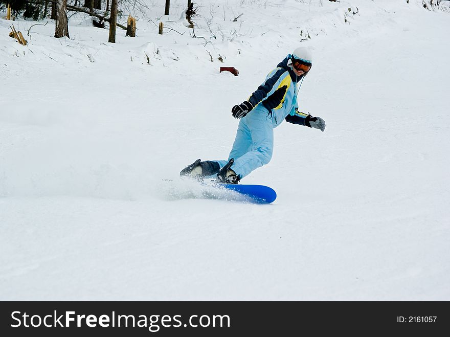 Girl Riding Fast On Snowboard