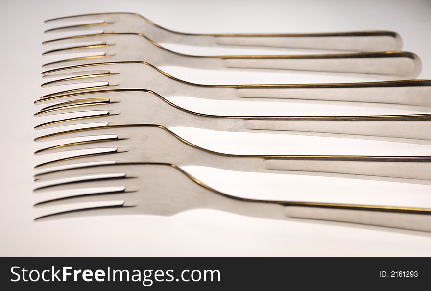 Forks set in a line