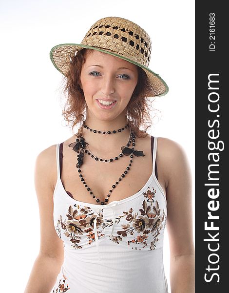 The girl in a sundress and a straw hat on a white background. The girl in a sundress and a straw hat on a white background