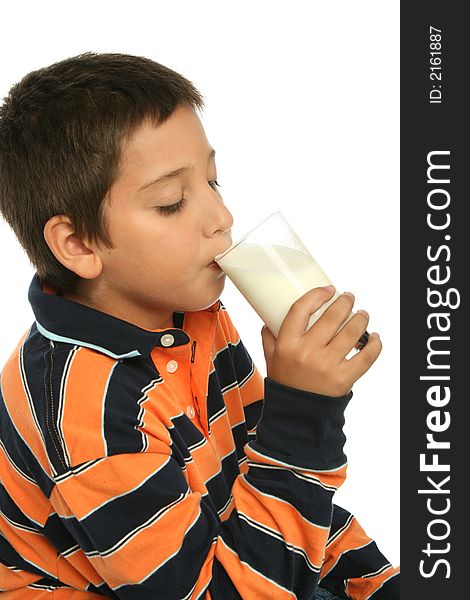 Boy drinking a glass of milk
