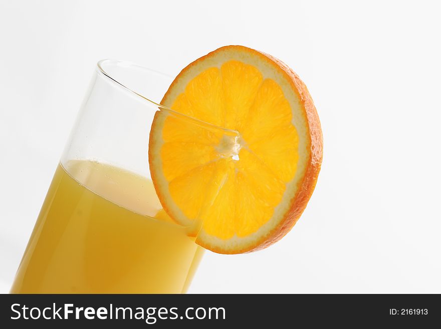 Orange slice on a juice glass