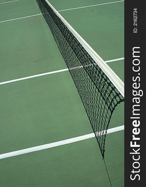 Close-up of a tennis court net.