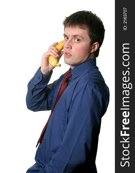 Businessman have a business conversation via the banana phone. Businessman have a business conversation via the banana phone