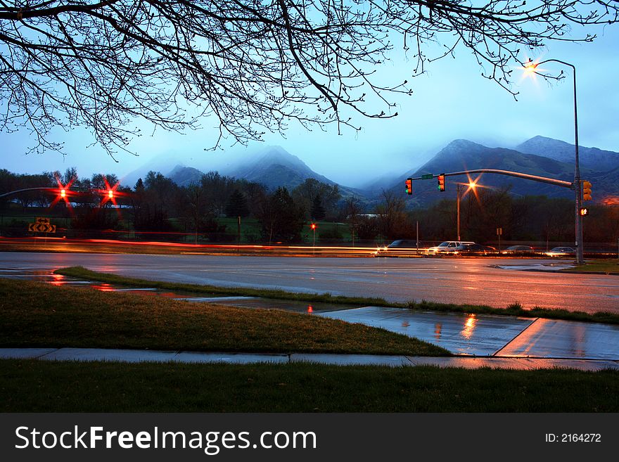 Rain and traffic at a busy intersection make for an explosion of events to be viewed. Rain and traffic at a busy intersection make for an explosion of events to be viewed