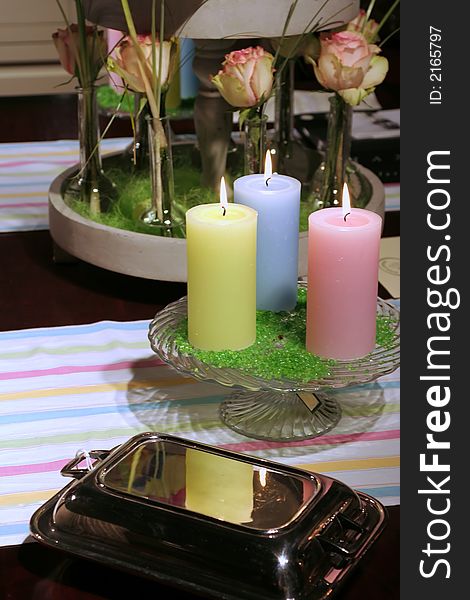 Butter dish and candles on table. Butter dish and candles on table