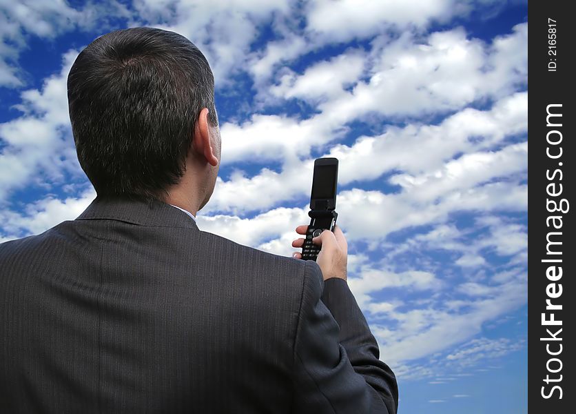 Salesman calling with his new cellphone