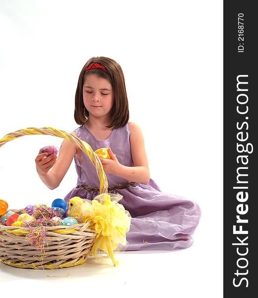 Young girl with an Easter Basket on white. Young girl with an Easter Basket on white