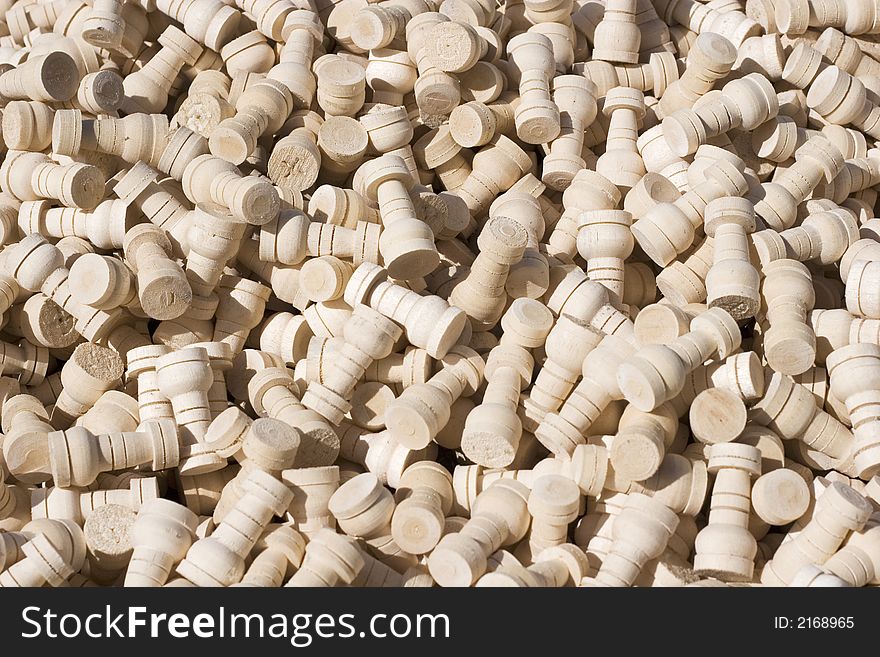 Wooden white chess pieces filling up the frame. Wooden white chess pieces filling up the frame