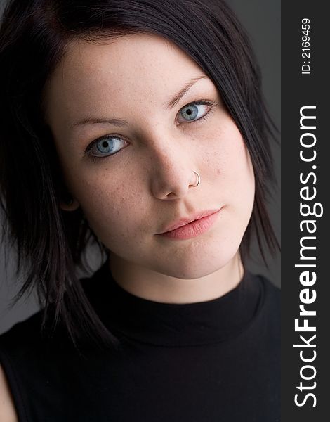 Portrait of a young woman with dark hair. Portrait of a young woman with dark hair