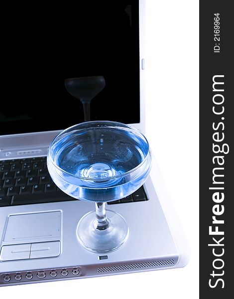 Laptop And A Glass With A Blue