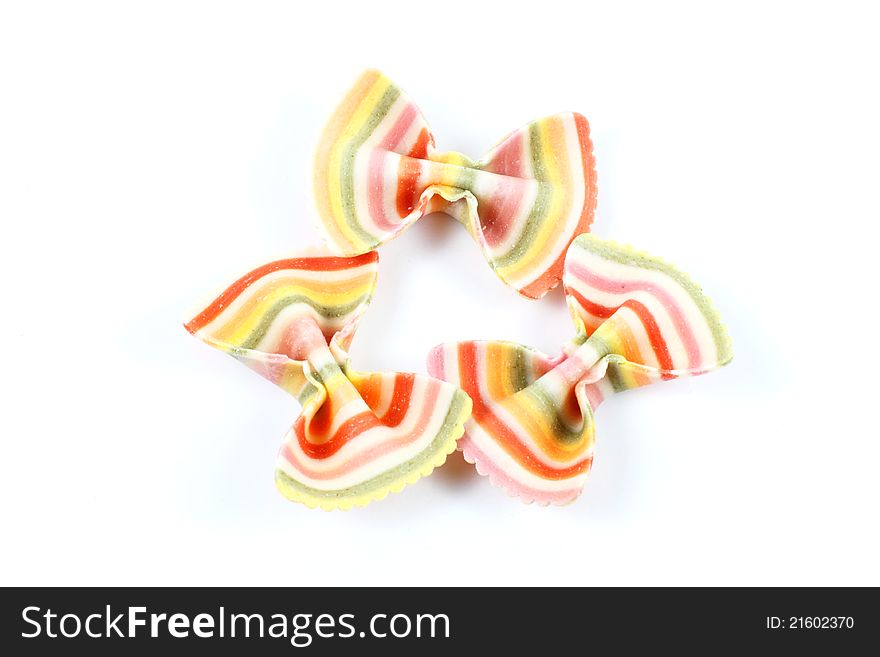 Three colourful ribbon pasta on the white background