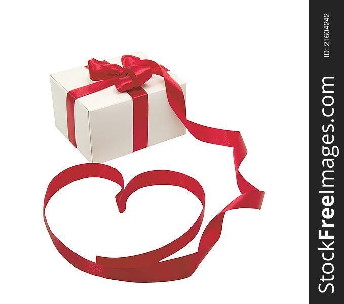 White gift with red  ribbon on Valentine's Day. White gift with red  ribbon on Valentine's Day