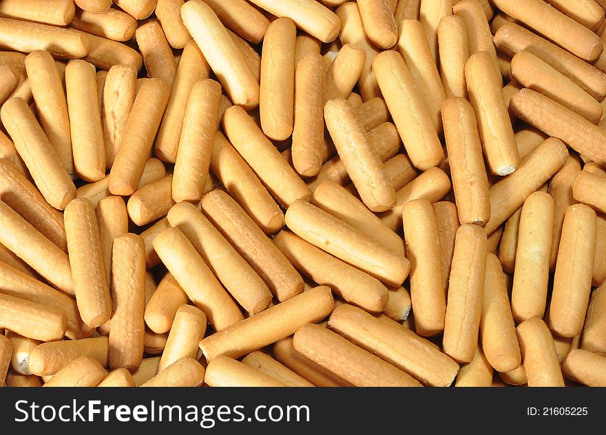 Short thick biscuit sticks as background