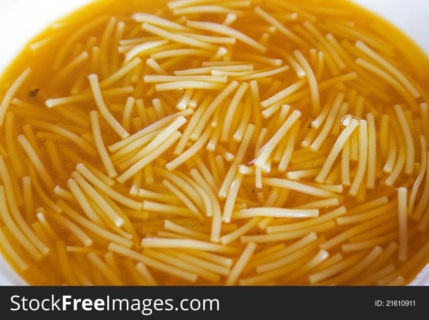 Close up view of a noodles soup