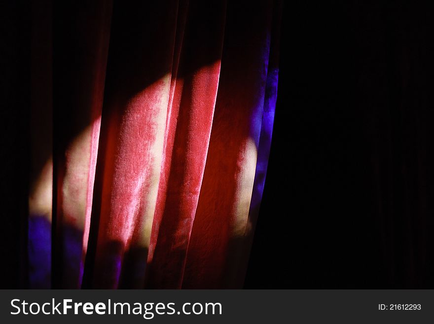 Light falling on the folds of a curtain. Light falling on the folds of a curtain