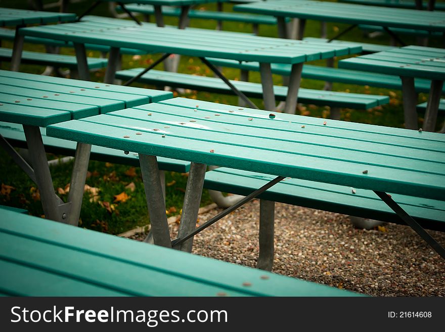 Many Green Picnic Tables