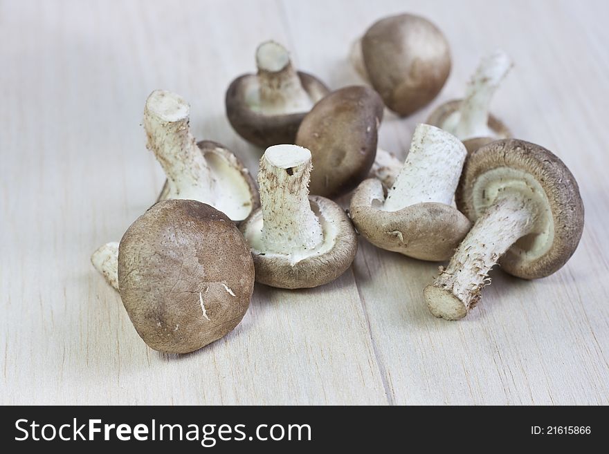 Fresh mushrooms on a wooden board