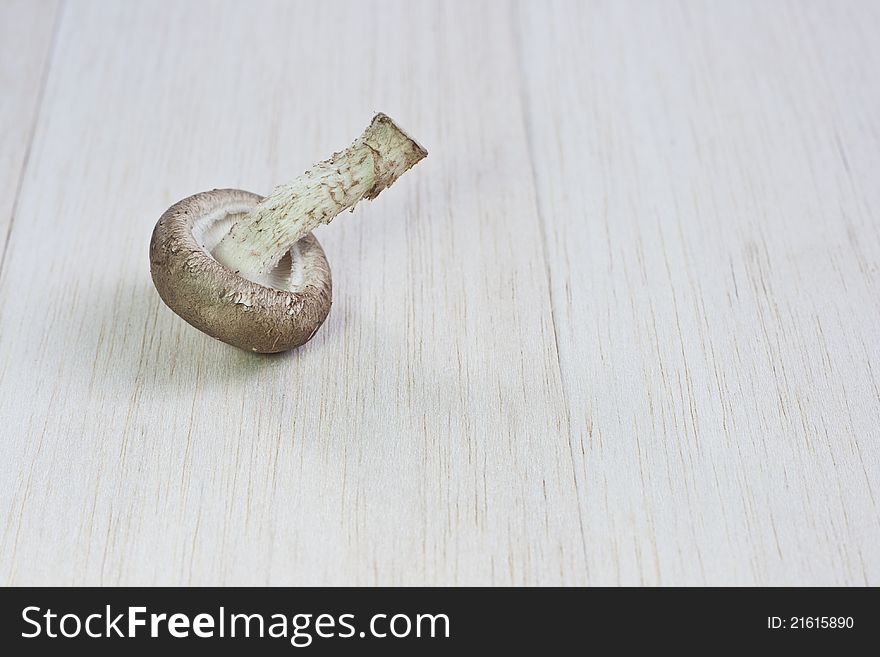 Fresh mushrooms on a wooden board