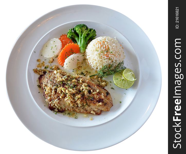 Roasted fish served with fried rice. Roasted fish served with fried rice