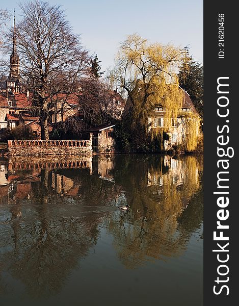 The city of Montbeliard, France. Reflection in the river. The city of Montbeliard, France. Reflection in the river.