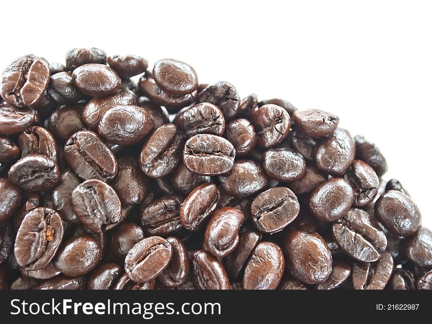 Coffee beans closeup isolate on white background. Coffee beans closeup isolate on white background