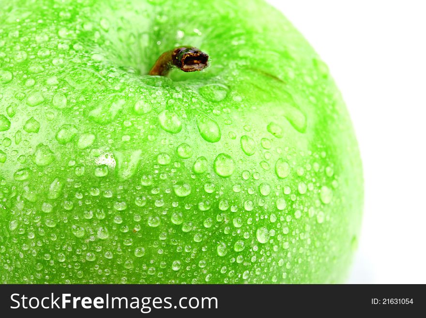 Water drop on green apple