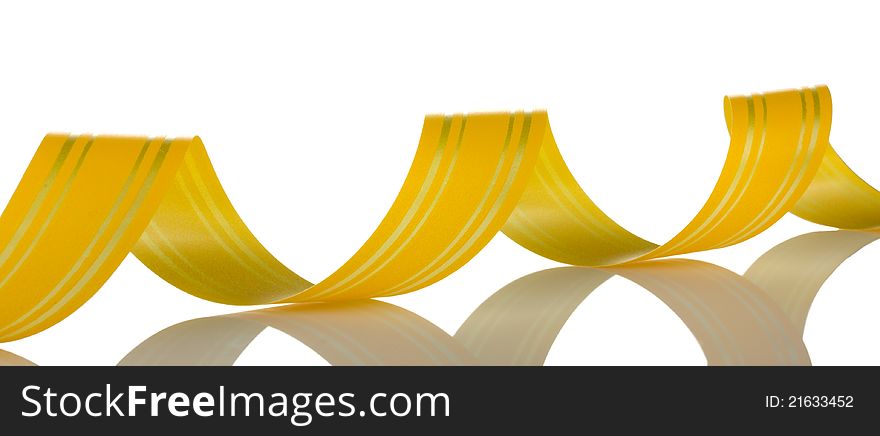 Curled yellow striped ribbon with reflection. Curled yellow striped ribbon with reflection