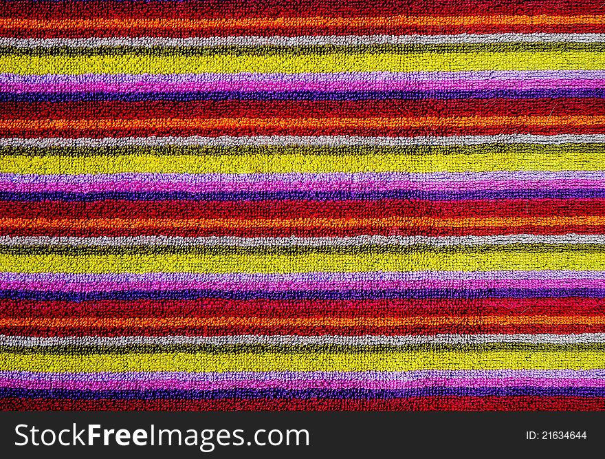 Colorful towel as background, horizontal stripes