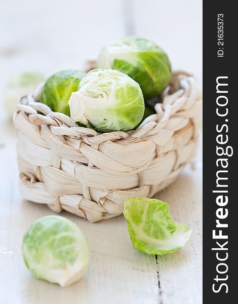 Fresh raw brussels sprouts in a basket