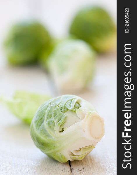 Fresh brussels sprouts on table closeup