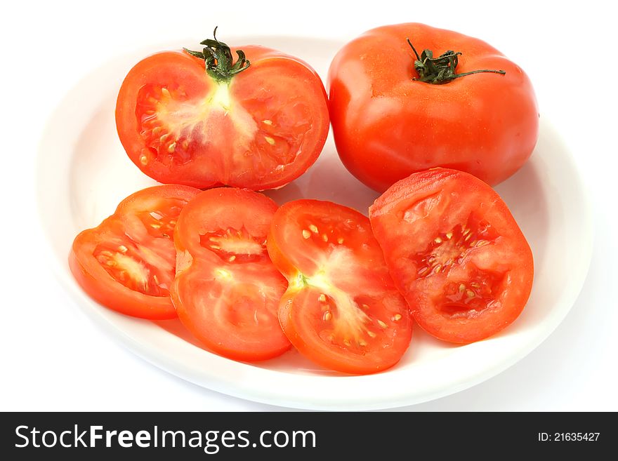 Red tomato vegetable with cut  on white background