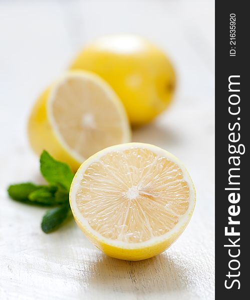 Fresh sliced yellow lemon on table